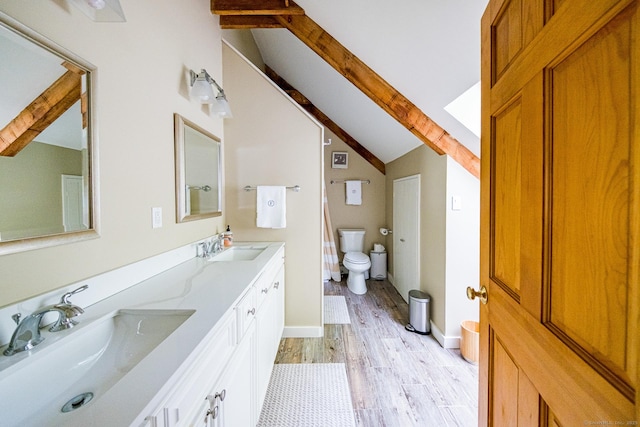 1900 Home Rd, Great Barrington, MA 01230 - bathroom with toilet, double vanity, wood finished floors, and baseboards