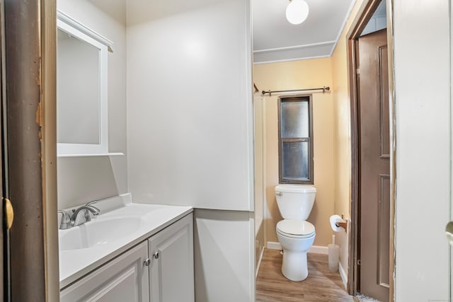 70 Woodland Park, Shelton, CT 06484 - full bathroom with toilet, vanity, wood finished floors, and baseboards