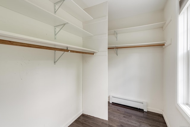 2 Acorn Dr, East Haddam, CT 06423 - spacious closet featuring a baseboard heating unit and dark wood-style flooring