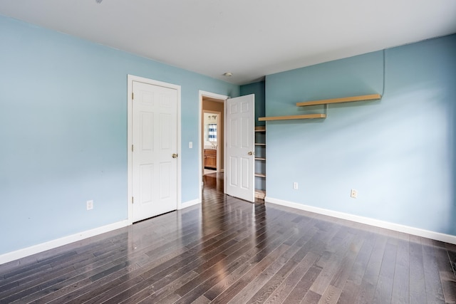 2 Acorn Dr, East Haddam, CT 06423 - unfurnished bedroom featuring dark wood-style flooring and baseboards