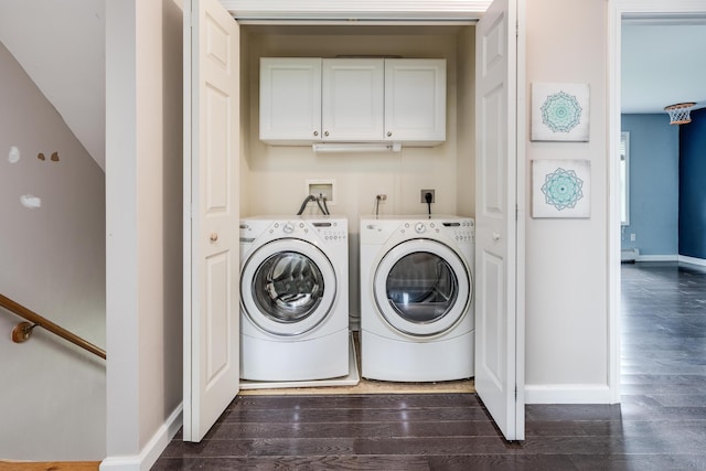 2 Acorn Dr, East Haddam, CT 06423 - laundry area with cabinet space, separate washer and dryer, dark wood finished floors, and baseboards