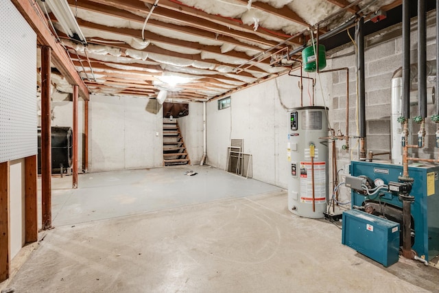 2 Acorn Dr, East Haddam, CT 06423 - unfinished basement with heat pump water heater, heating fuel, a heating unit, and stairway