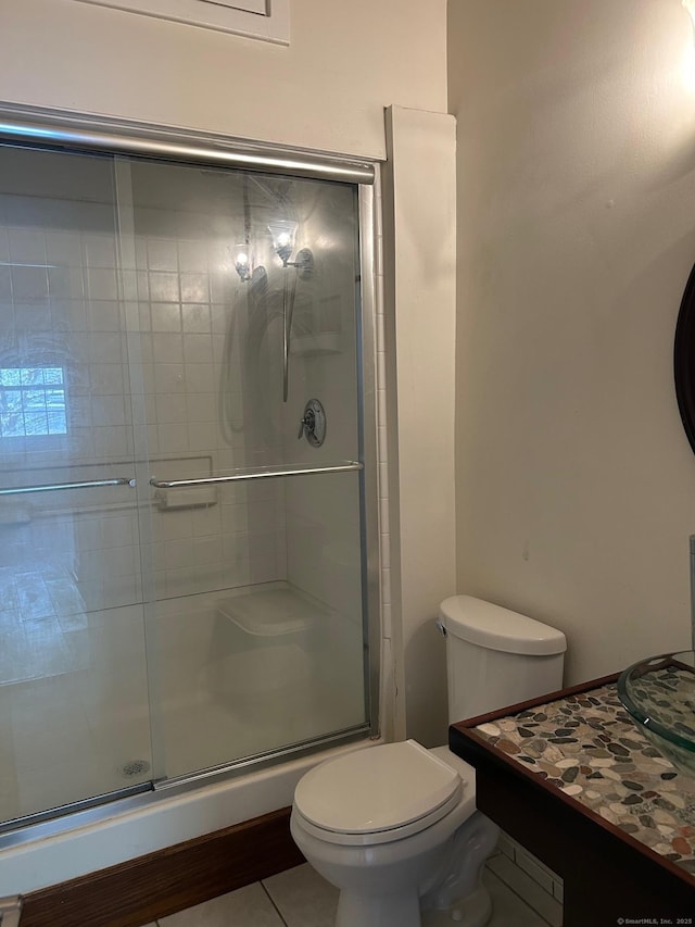 68 Thermos Ave Unit 410E, Norwich, CT 06360 - bathroom with a stall shower, tile patterned floors, and vanity