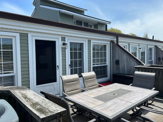 68 Thermos Ave Unit 410E, Norwich, CT 06360 - wooden terrace with outdoor dining area