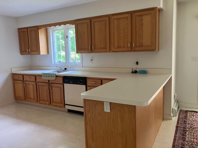 116 Taylor Rd, New Milford, CT 06776 - kitchen featuring dishwashing machine, brown cabinets, a peninsula, and light countertops