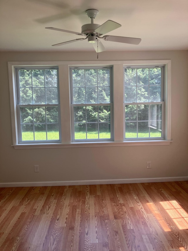 116 Taylor Rd, New Milford, CT 06776 - empty room with a ceiling fan and wood finished floors