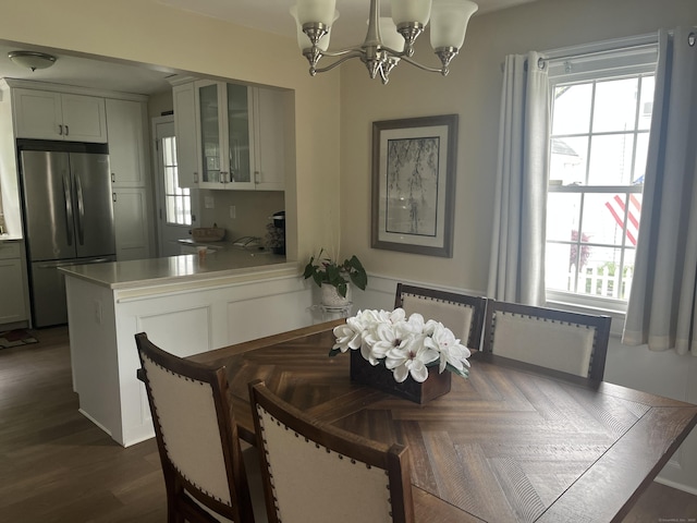 24 Westview St, Hamden, CT 06514 - dining room featuring plenty of natural light, a chandelier, and radiator