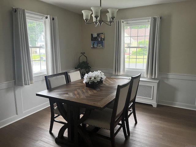 24 Westview St, Hamden, CT 06514 - dining space featuring a chandelier, dark wood finished floors, and wainscoting