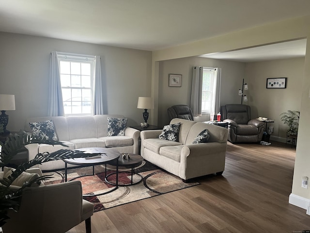 24 Westview St, Hamden, CT 06514 - living area featuring wood finished floors and baseboards
