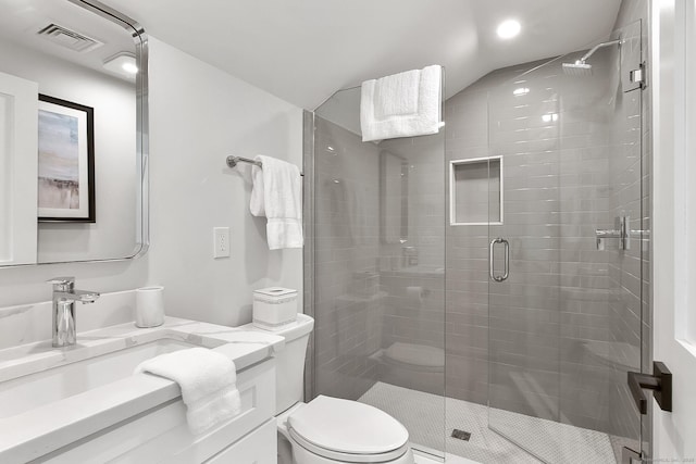 1 Howard Ave Unit C2, Norwalk, CT 06855 - bathroom with toilet, vanity, a shower stall, lofted ceiling, and recessed lighting