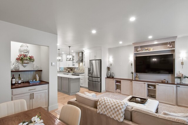 1 Howard Ave Unit C2, Norwalk, CT 06855 - living area featuring recessed lighting and light wood-style flooring