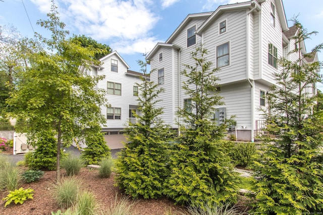 1 Howard Ave Unit C2, Norwalk, CT 06855 - view of building exterior with a garage
