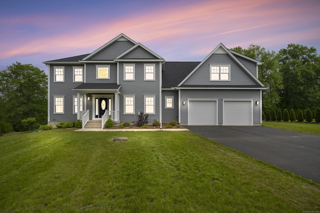 14 Fiddlehead Pl, Suffield, CT 06078 - view of front of house with driveway and a yard