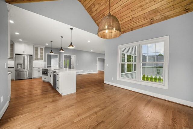 14 Fiddlehead Pl, Suffield, CT 06078 - kitchen featuring stainless steel appliances, a sink, open floor plan, glass insert cabinets, and white cabinets