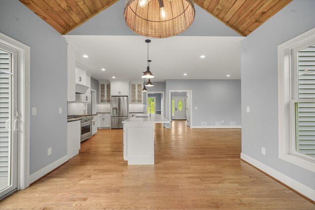 14 Fiddlehead Pl, Suffield, CT 06078 - kitchen with high quality appliances, vaulted ceiling, white cabinets, wooden ceiling, and glass insert cabinets