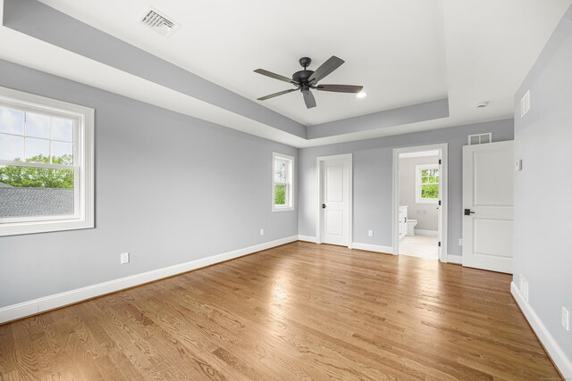 14 Fiddlehead Pl, Suffield, CT 06078 - unfurnished bedroom with multiple windows, light wood finished floors, and baseboards