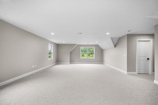 14 Fiddlehead Pl, Suffield, CT 06078 - additional living space with carpet flooring, baseboards, recessed lighting, and vaulted ceiling