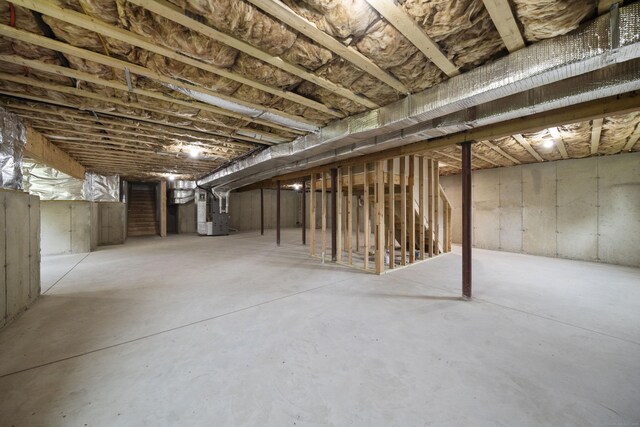 14 Fiddlehead Pl, Suffield, CT 06078 - unfinished basement featuring heating unit and stairs