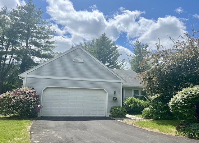 20 Canterbury Rd Unit 20, Hamden, CT 06514 - view of front of house with an attached garage and driveway