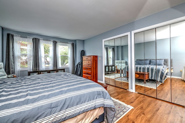 20 Canterbury Rd Unit 20, Hamden, CT 06514 - bedroom featuring two closets and wood finished floors