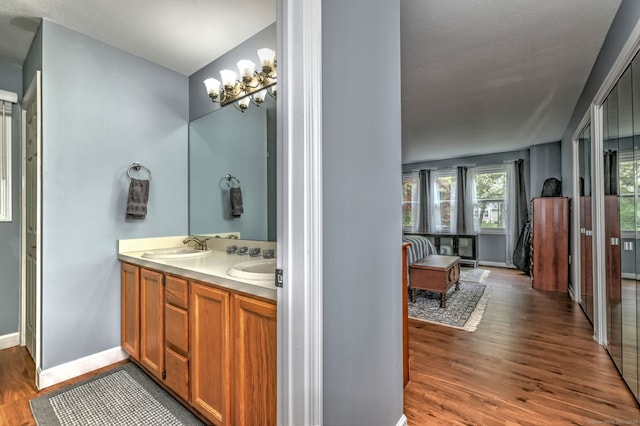 20 Canterbury Rd Unit 20, Hamden, CT 06514 - full bath with double vanity and wood finished floors