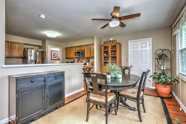 20 Canterbury Rd Unit 20, Hamden, CT 06514 - dining space with light wood finished floors, a ceiling fan, and recessed lighting