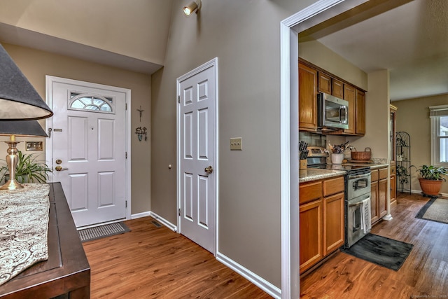 20 Canterbury Rd Unit 20, Hamden, CT 06514 - foyer featuring wood finished floors and baseboards