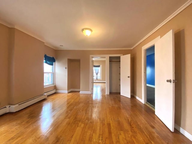 24 Townley St, Hartford, CT 06105 - spare room featuring wood finished floors, ornamental molding, and baseboards