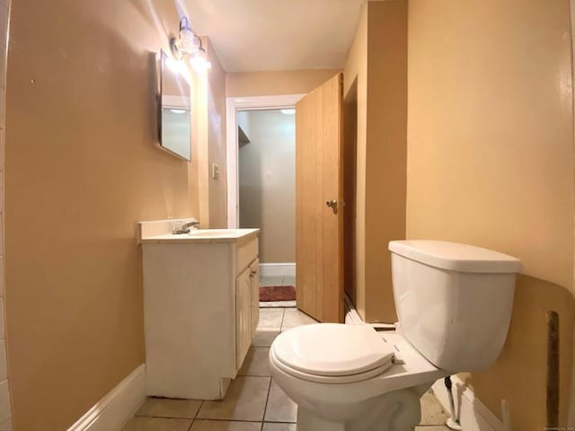 24 Townley St, Hartford, CT 06105 - bathroom with toilet, vanity, tile patterned flooring, and baseboards