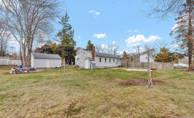 14 Denmore Ln, Old Saybrook, CT 06475 - view of yard featuring an outdoor structure and an outdoor fire pit