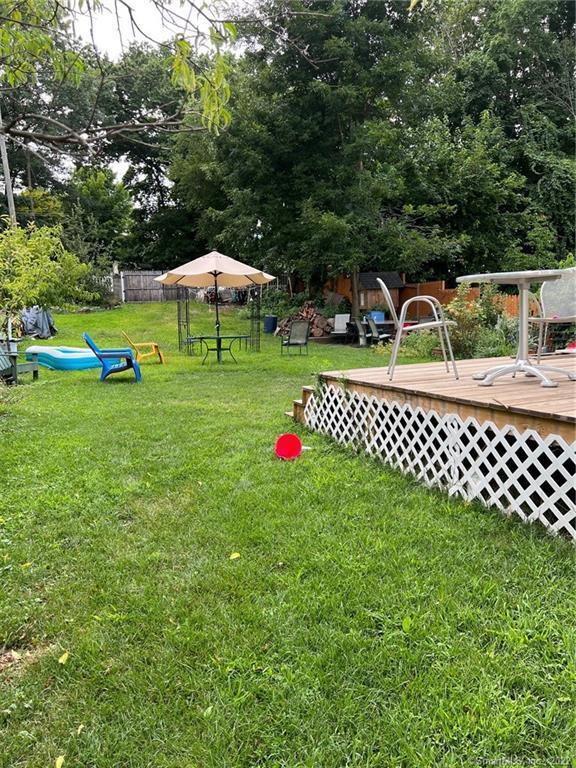 385 Chamberlain Ave, Bridgeport, CT 06606 - view of yard featuring a wooden deck
