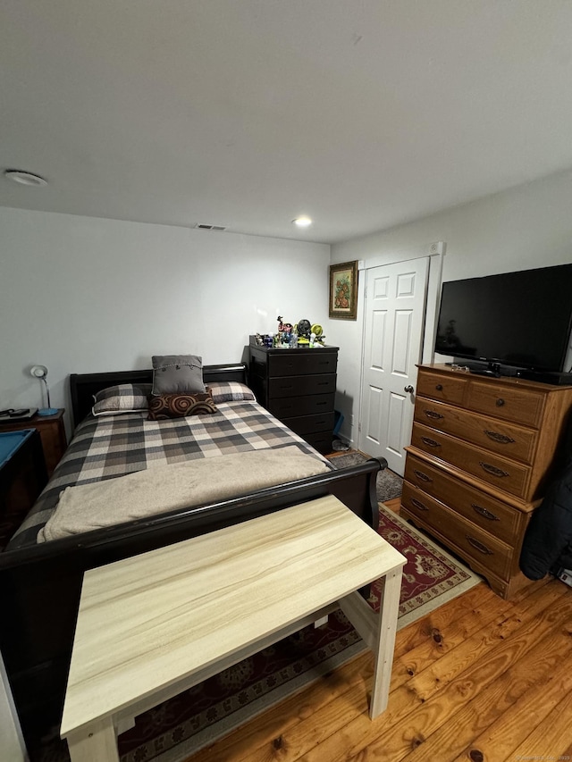 385 Chamberlain Ave, Bridgeport, CT 06606 - bedroom with wood finished floors