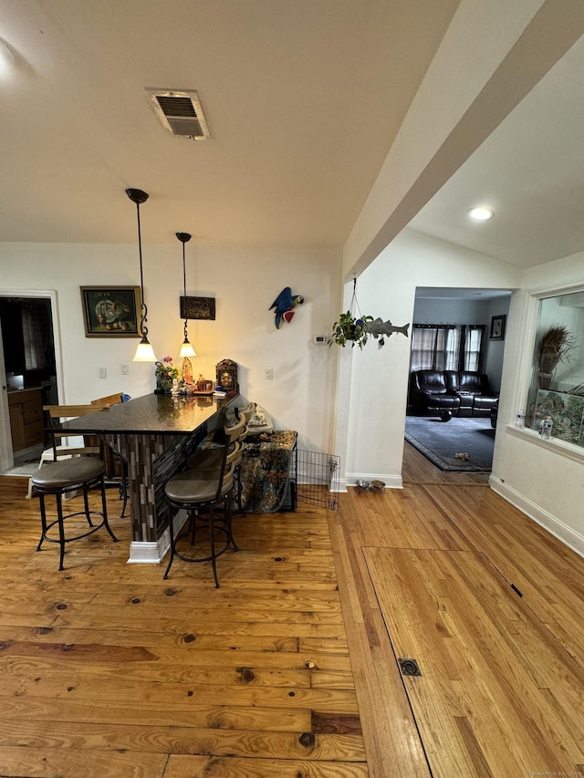 385 Chamberlain Ave, Bridgeport, CT 06606 - dining room featuring wood-type flooring and baseboards