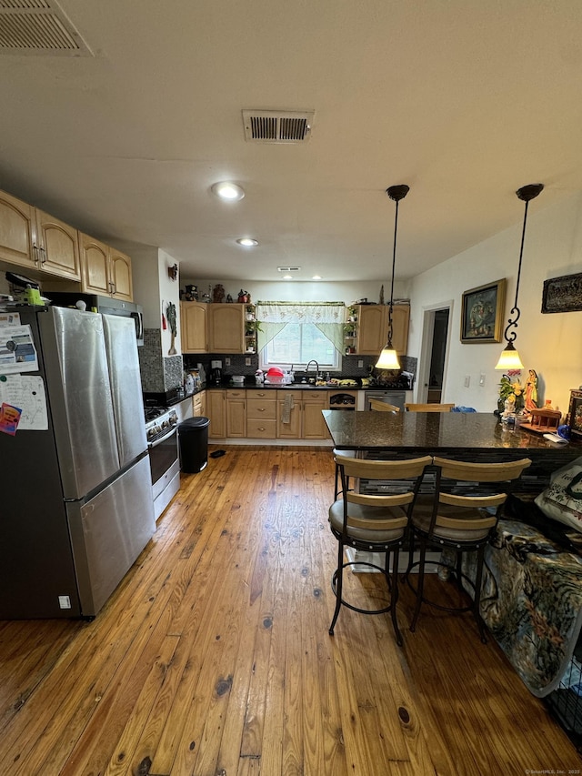 385 Chamberlain Ave, Bridgeport, CT 06606 - dining space featuring wood-type flooring and recessed lighting