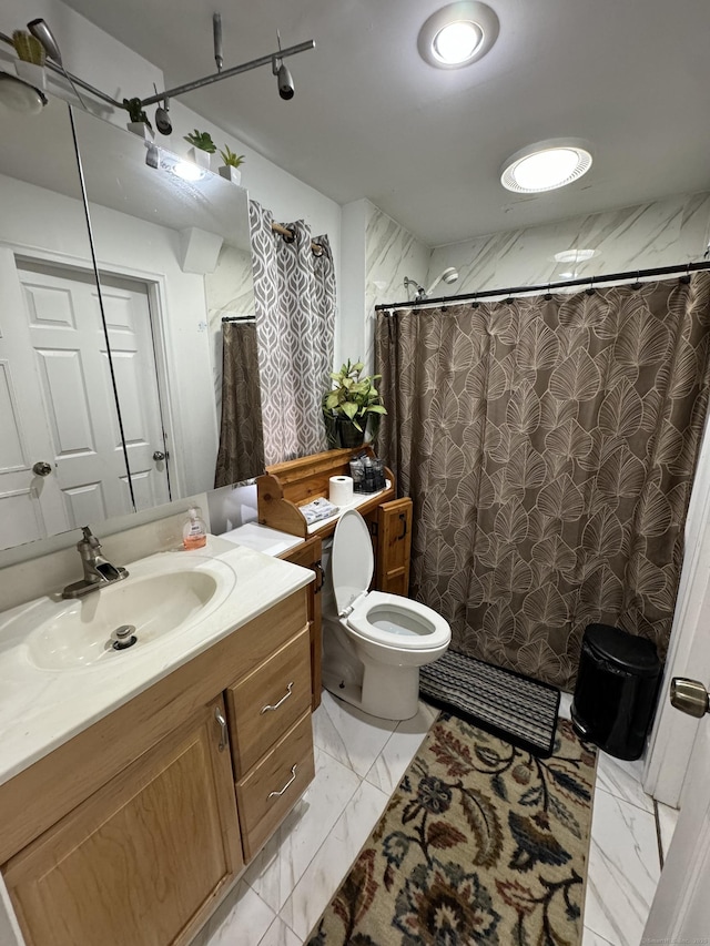 385 Chamberlain Ave, Bridgeport, CT 06606 - bathroom featuring vanity, toilet, marble finish flooring, and a shower with shower curtain