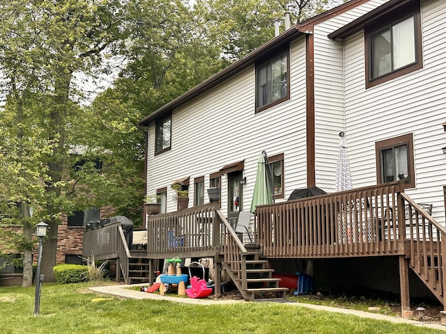 529 Woodward Ave Apt C, New Haven, CT 06512 - back of house featuring stairs, a deck, and a lawn
