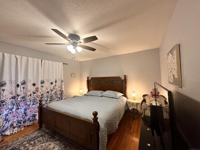 529 Woodward Ave Apt C, New Haven, CT 06512 - bedroom featuring wood finished floors, a ceiling fan, and a textured ceiling