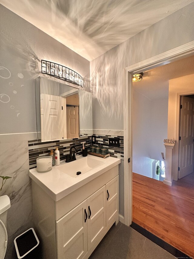 529 Woodward Ave Apt C, New Haven, CT 06512 - bathroom with vanity, tile walls, toilet, and tile patterned floors
