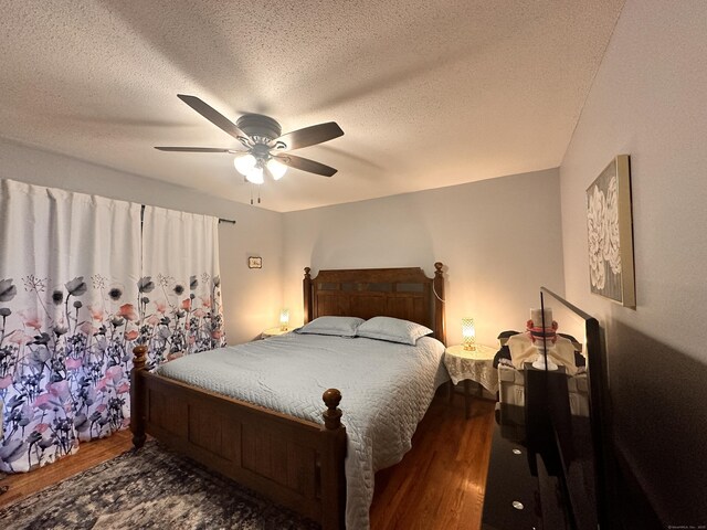 529 Woodward Ave Apt C, New Haven, CT 06512 - bedroom featuring wood finished floors, a ceiling fan, and a textured ceiling