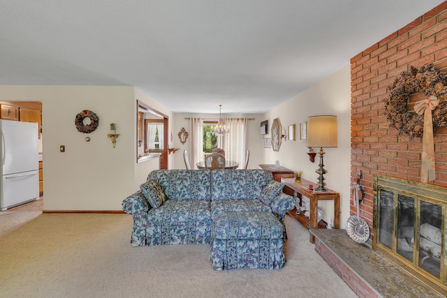 197 Hummingbird Dr, Berlin, CT 06037 - living room with light carpet, a chandelier, a brick fireplace, and baseboards