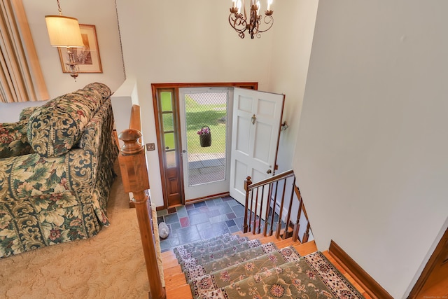 197 Hummingbird Dr, Berlin, CT 06037 - entrance foyer featuring a chandelier and stone finish flooring