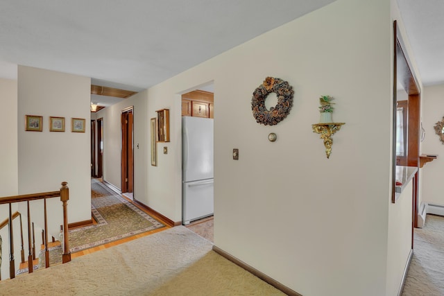 197 Hummingbird Dr, Berlin, CT 06037 - hallway featuring an upstairs landing, light carpet, and baseboards