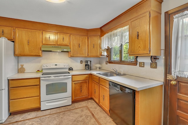197 Hummingbird Dr, Berlin, CT 06037 - kitchen with white appliances, under cabinet range hood, a sink, and light countertops