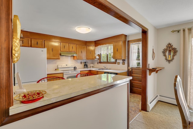 197 Hummingbird Dr, Berlin, CT 06037 - kitchen featuring white appliances, under cabinet range hood, light countertops, a peninsula, and brown cabinets