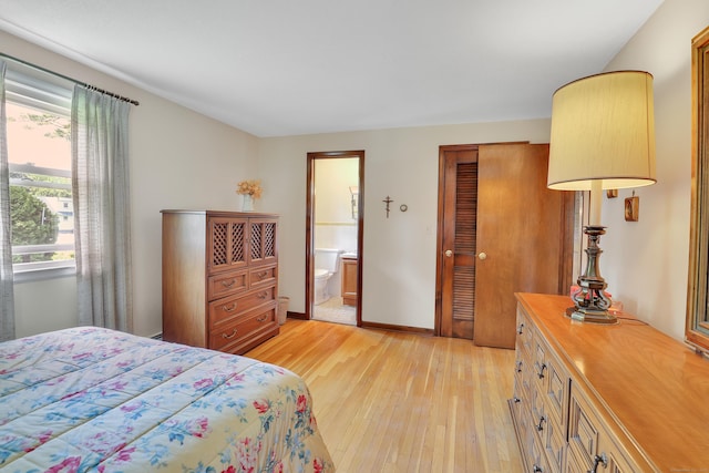 197 Hummingbird Dr, Berlin, CT 06037 - bedroom featuring light wood-style floors, connected bathroom, a closet, and baseboards