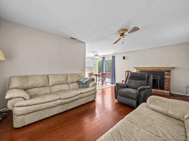 5 Marian Ln, Clinton, CT 06413 - living area with ceiling fan, hardwood / wood-style flooring, and a textured ceiling