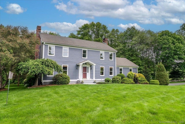 10 Hundred Acres Rd, Newtown, CT 06470 - colonial-style house with a chimney and a front yard