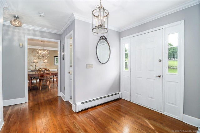 10 Hundred Acres Rd, Newtown, CT 06470 - foyer featuring a baseboard radiator, a chandelier, plenty of natural light, dark wood-style floors, and ornamental molding