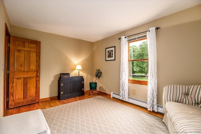 10 Hundred Acres Rd, Newtown, CT 06470 - living area featuring wood finished floors, baseboards, and baseboard heating