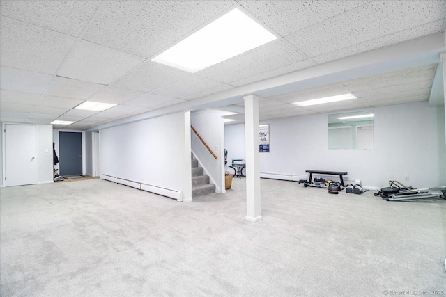 10 Hundred Acres Rd, Newtown, CT 06470 - finished below grade area with a baseboard radiator, stairway, a paneled ceiling, and carpet flooring